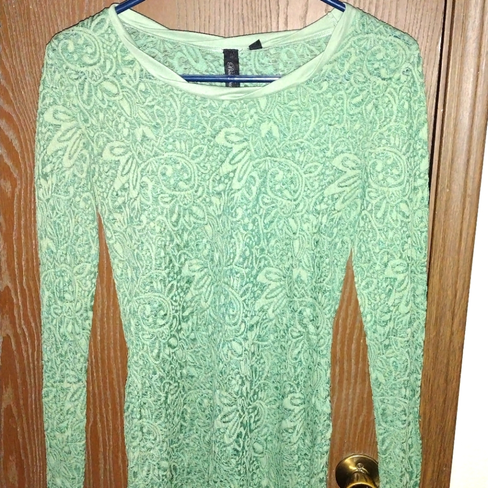 Woman's lacy sheer long sleeve top